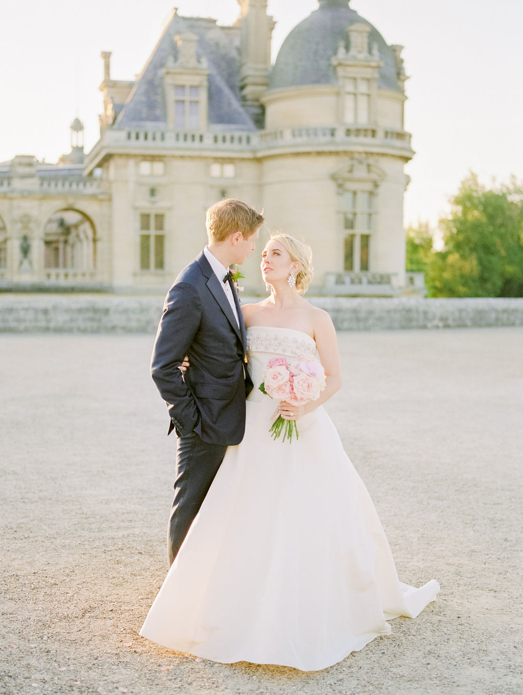 Bride and groom portrait at a French château wedding planned by Fête in France