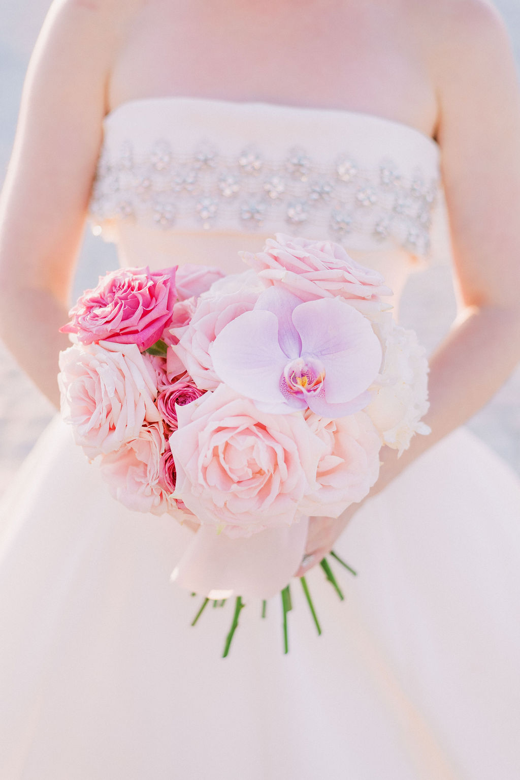 Pink bridal bouquet at a French château wedding planned by Fête in France