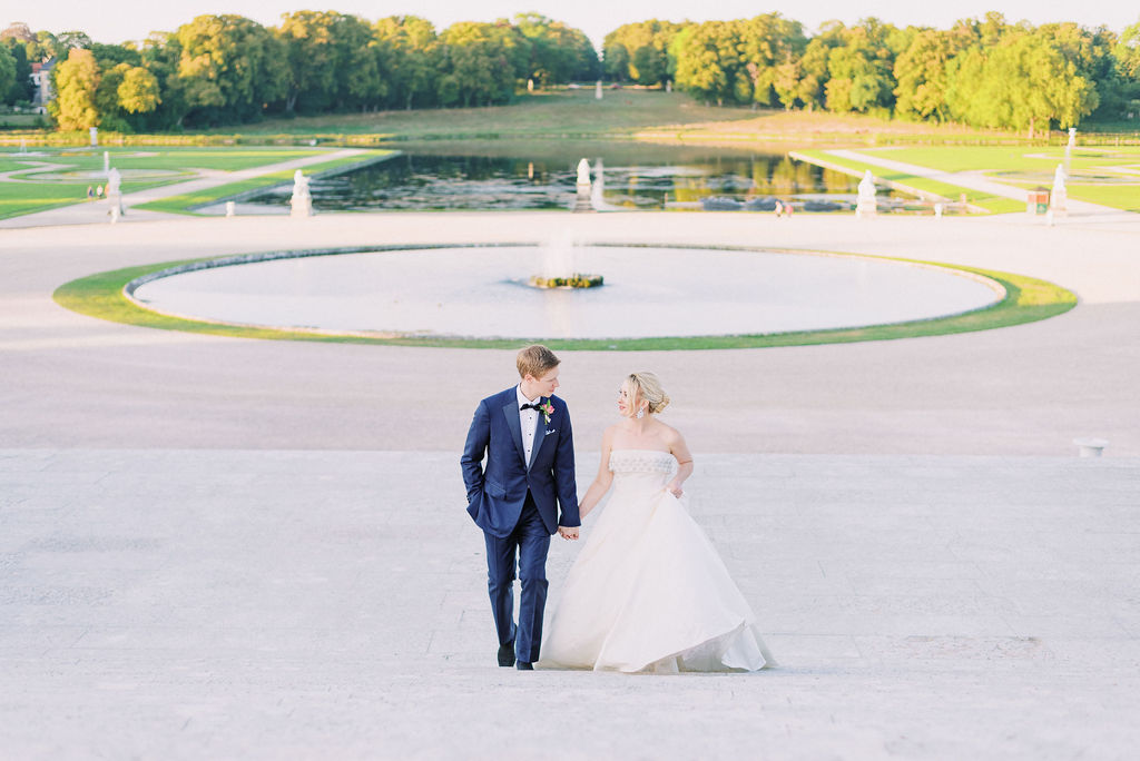 Bride and groom portrait at French château wedding planned by Fête in France